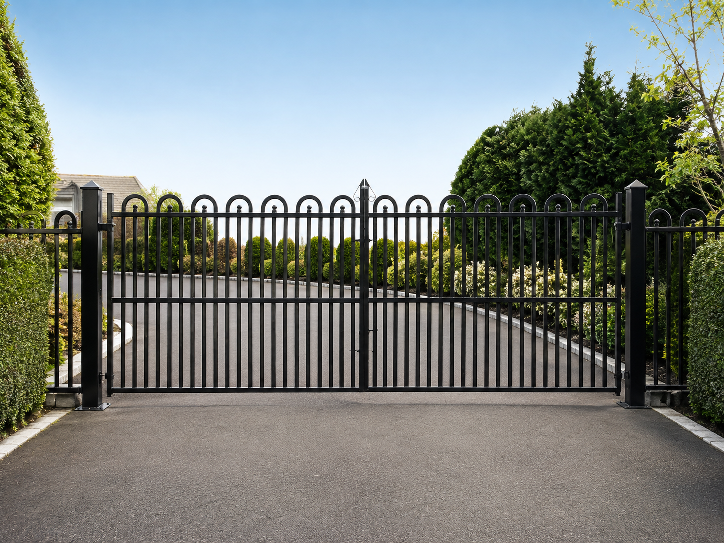 Residential steel driveway gates with matching railings by Marmion Engineering