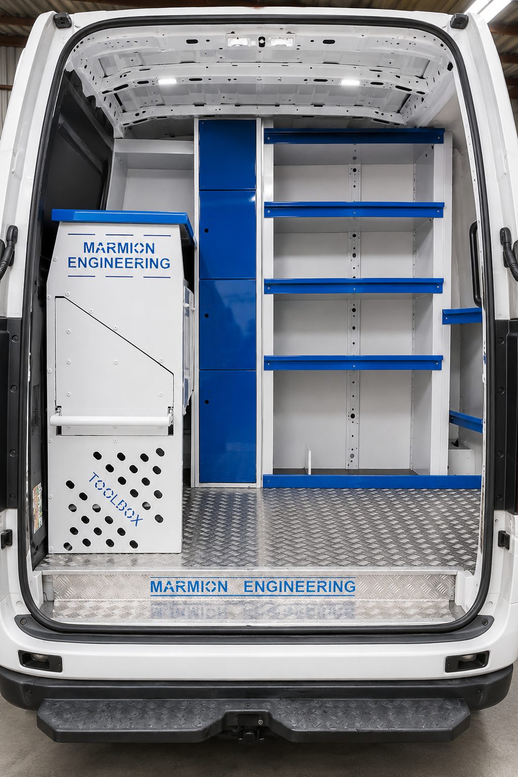 Rear view of completed van fitout with blue-lipped shelving, Dundalk
