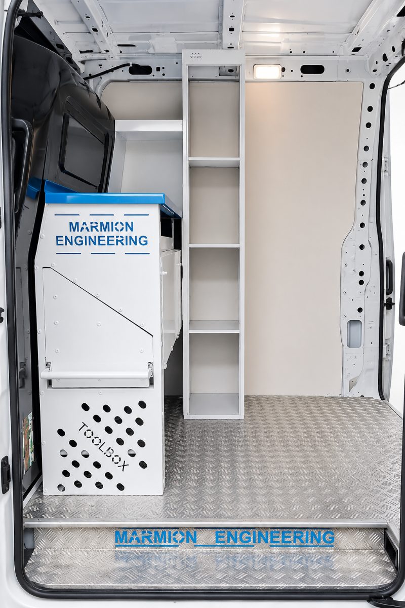 Side-door toolbox and tall locker unit in a worker van